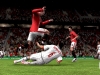 manuxbmun_rooneydemichelis_slide-tackle-940x528